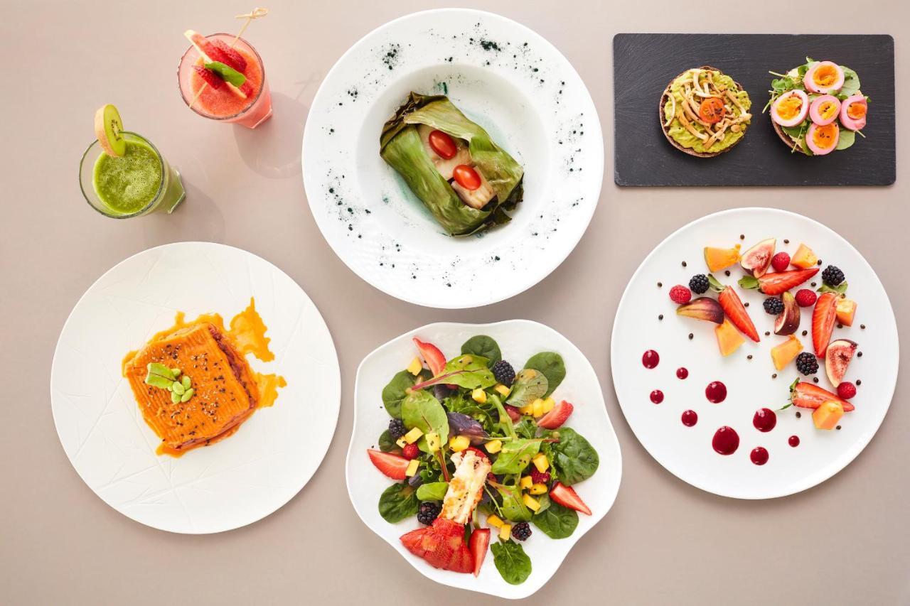 Longevity Health & Wellness Hotel - Adults Only Alvor Exterior foto A selection of dishes from the restaurant